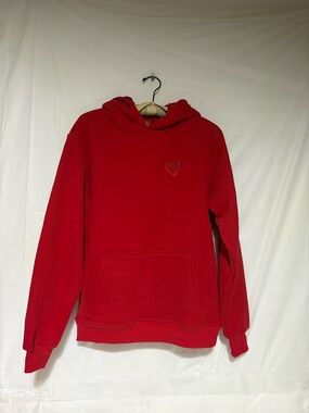 Love magnet. Women's Red Hooded Pullover Sweatshirt with Heart Detail